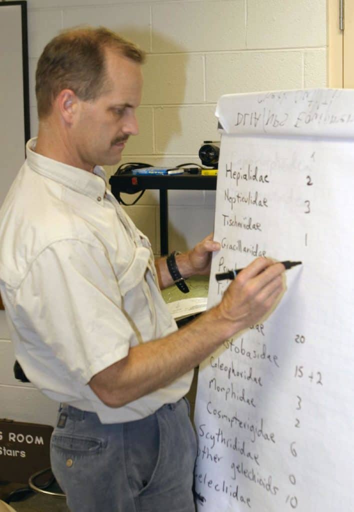 Dr. David Wagner tallies the number of moths and butterflies identified during a 2004 bioblitz